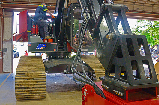 A mobile heavy equipment mechanic who works on construction machines at WP mechanic shop in Lufkin